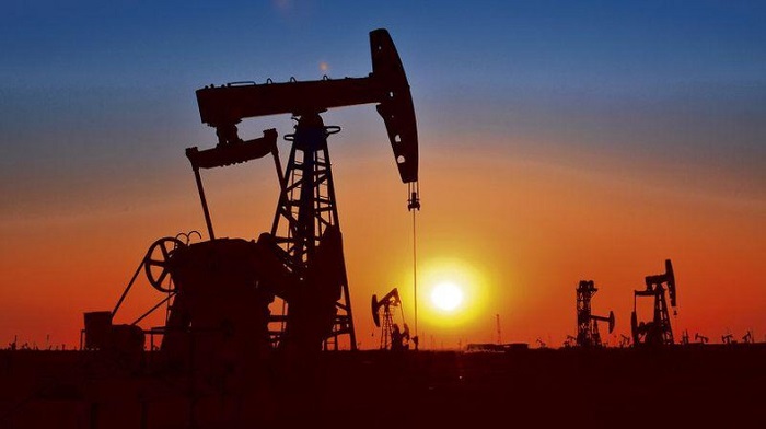 Oil hits 2016 high on ebbing supply, softer dollar